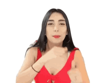 Woman Giving Thumbs Up in Red Top