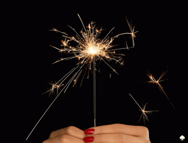Woman Hand Holding Sparkles GIF