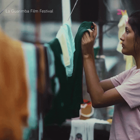 Woman Hanging Clothes With La Guarimba Film Festival