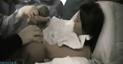 Woman Holding Baby In Hospital Bed GIF