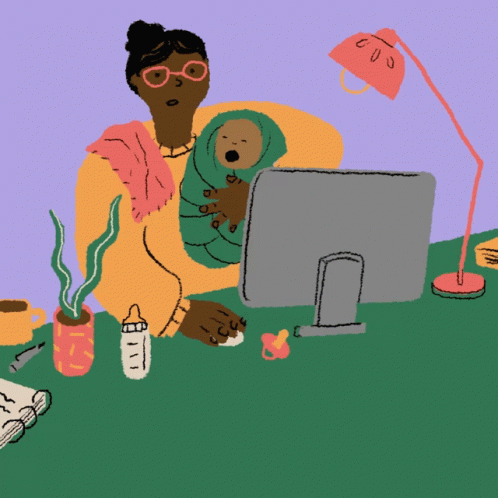 Woman Holding Baby Using Computer