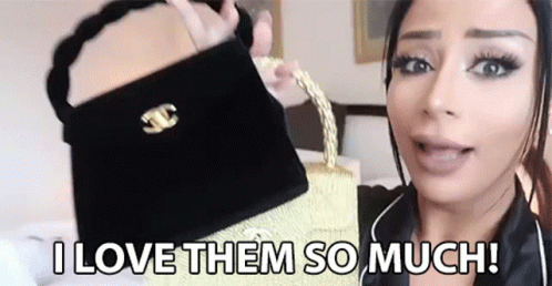 Woman Holding Black Purse Saying I Love Them So Much