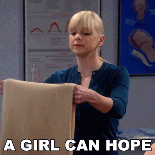Woman Holding Blanket Saying A Girl Can Hope