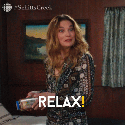 Woman Holding Bottle Saying Relax GIF