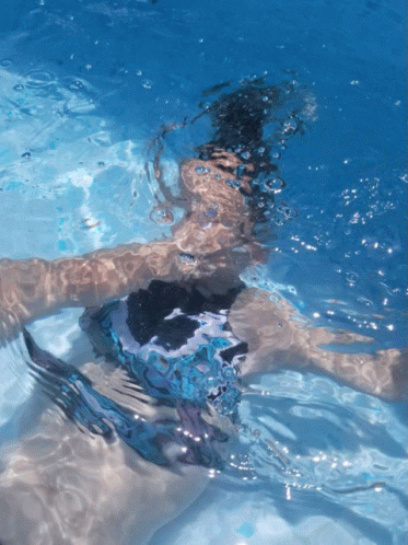 Woman Holding Breath Under The Pool GIF