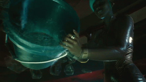 Woman Holding Bucket Of Ice Cubes GIF
