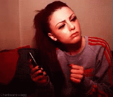 Woman Holding Cell Phone Saying Chorbearswagg
