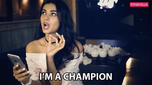 Woman Holding Cell Phone Saying I'm a Champion