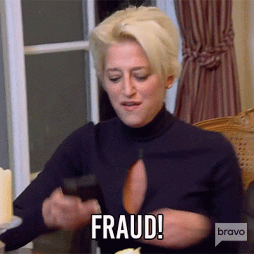 Woman Holding Cell Phone Says Fraud GIF