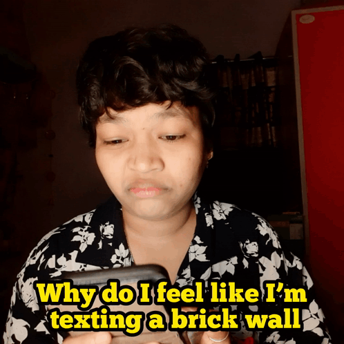 Woman Holding Cell Phone Why Do I Feel Like I'm Texting a Brick Wall