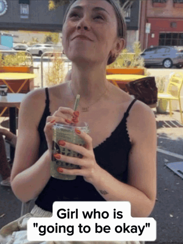Woman Holding Drink Saying Going to Be Okay