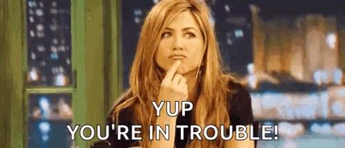 Woman Holding Finger To Chin Saying You're In Trouble GIF