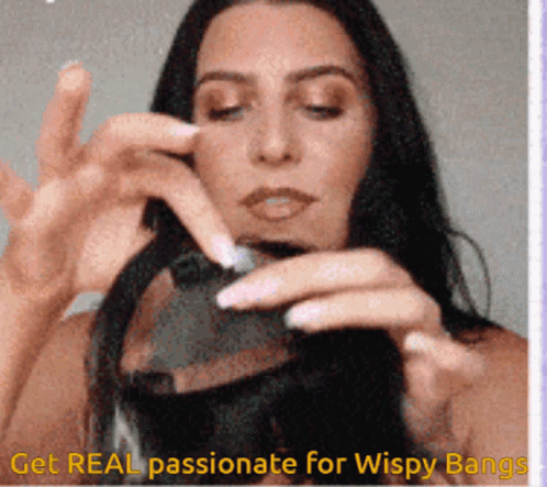 Woman Holding Hair Get Real Passionate For Wispy Bangs GIF