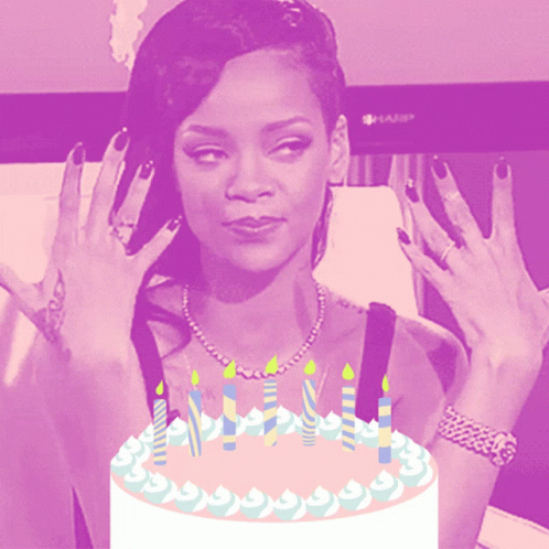 Woman Holding Hands Up In Front Of Birthday Cake GIF