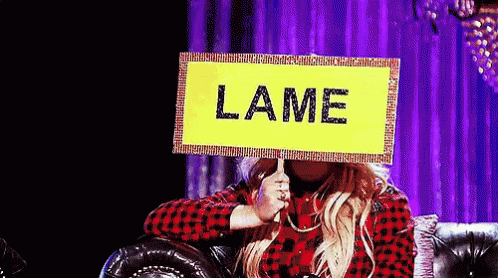 Woman Holding Lame Sign GIF