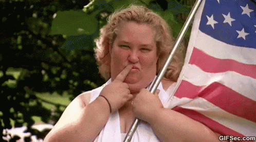 Woman Holding Large American Flag Funny Face