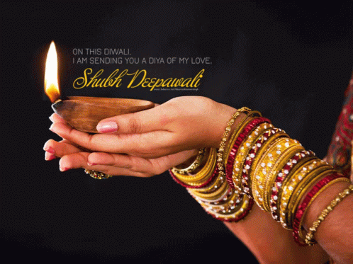 Woman Holding Lit Candle With Shubh Deepawali Message GIF