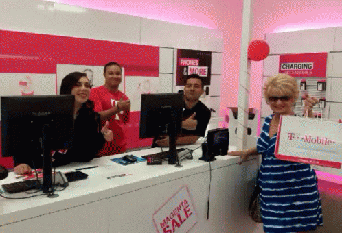 Woman Holding Magenta Sale Bag at T-Mobile Store