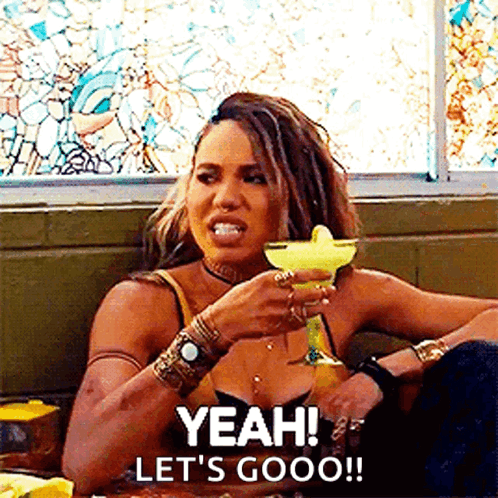 Woman Holding Margarita Saying Yeah Lets Go