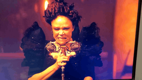 Woman Holding Microphone Making Face