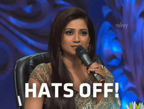 Woman Holding Microphone Saying Hats Off GIF