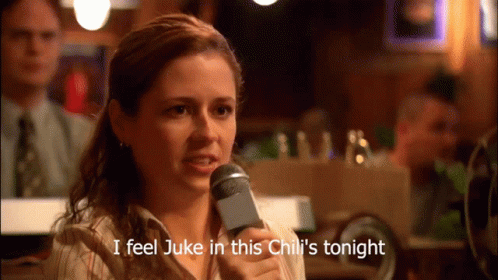 Woman Holding Microphone Saying I Feel Juke in Chili's Tonight