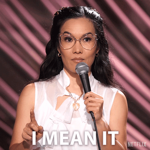 Woman Holding Microphone Saying I Mean It