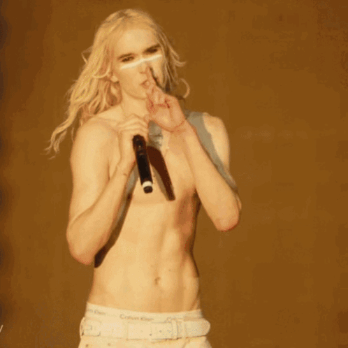 Woman Holding Microphone Shushing GIF