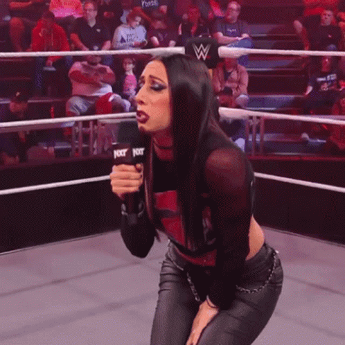 Woman Holding Microphone With NXT GIF