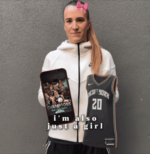 Woman Holding Phone And New York Jersey GIF
