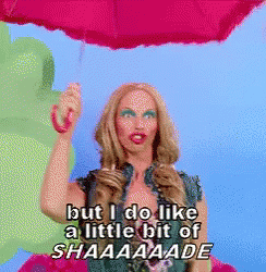 Woman Holding Pink Umbrella Saying But I Do Like A Little Bit Of Shaaaaade GIF