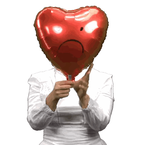 Woman Holding Sad Heart Balloon