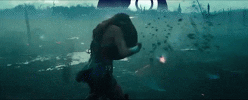 Woman Holding Shield In Battle Scene GIF