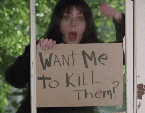 Woman Holding Sign Saying Want Me To Kill Them GIF