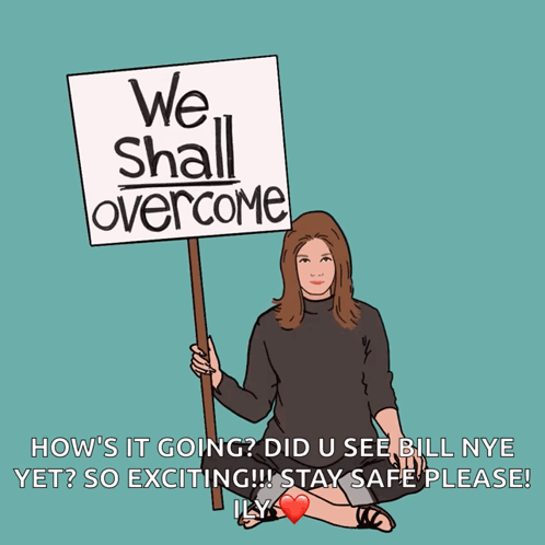 Woman Holding Sign Saying We Shall Overcome