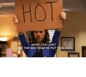 Woman Holding Sign Saying What Can I Say GIF