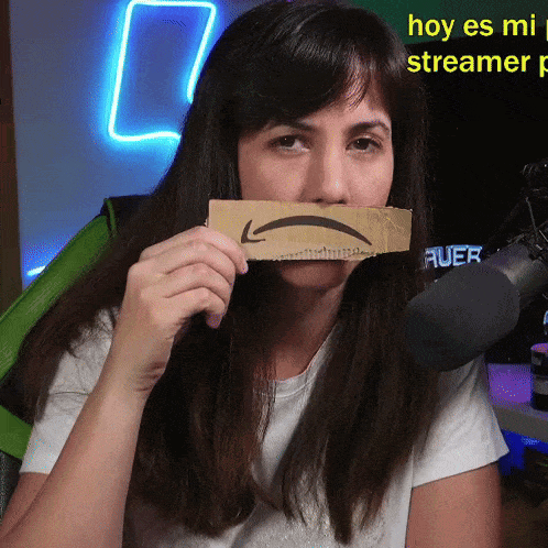 Woman Holding Smiley Face Cardboard