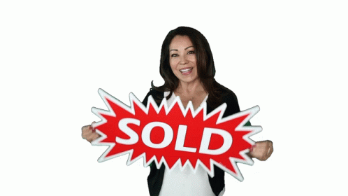 Woman Holding Sold Placard GIF
