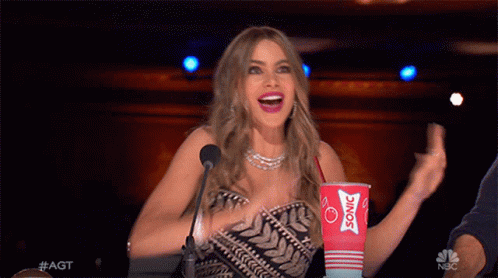 Woman Holding Sonic Cup