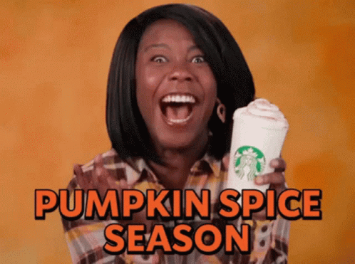 Woman Holding Starbucks Cup Pumpkin Spice Season