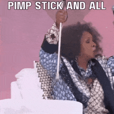 Woman Holding Stick Saying Pimp Stick And All GIF