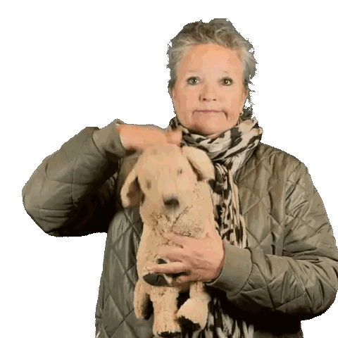 Woman Holding Stuffed Dog