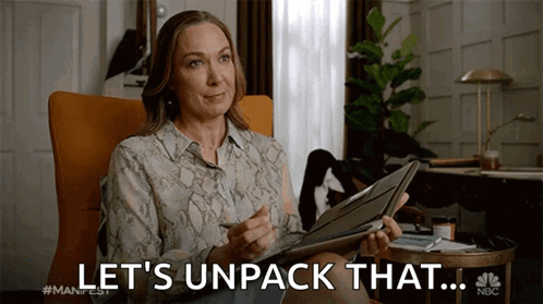 Woman Holding Tablet Saying Let's Unpack That