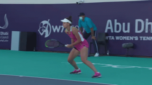 Woman Holding Tennis Racquet GIF