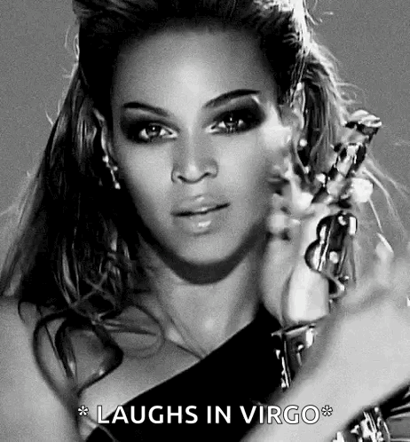 Woman Holding Trophy and Laughing in Virgo