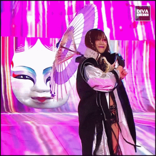 Woman Holding Umbrella In Front Of Diva Clock GIF