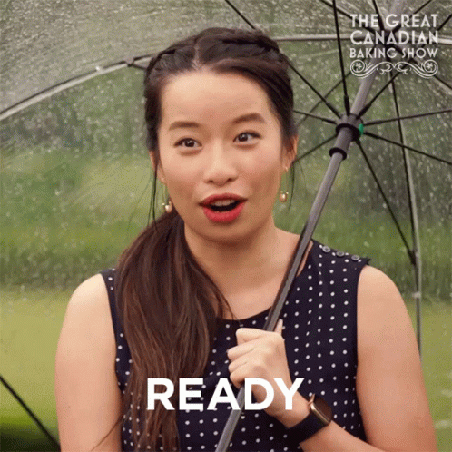 Woman Holding Umbrella Saying Ready