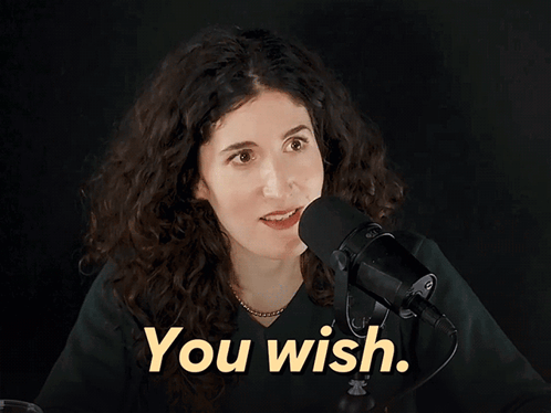 Woman Holding Voodoo Doll Talking on Phone