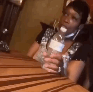 Woman Holding Water Bottle