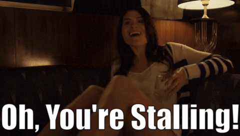 Woman Holding Whiskey Saying Uh You're Stalling GIF